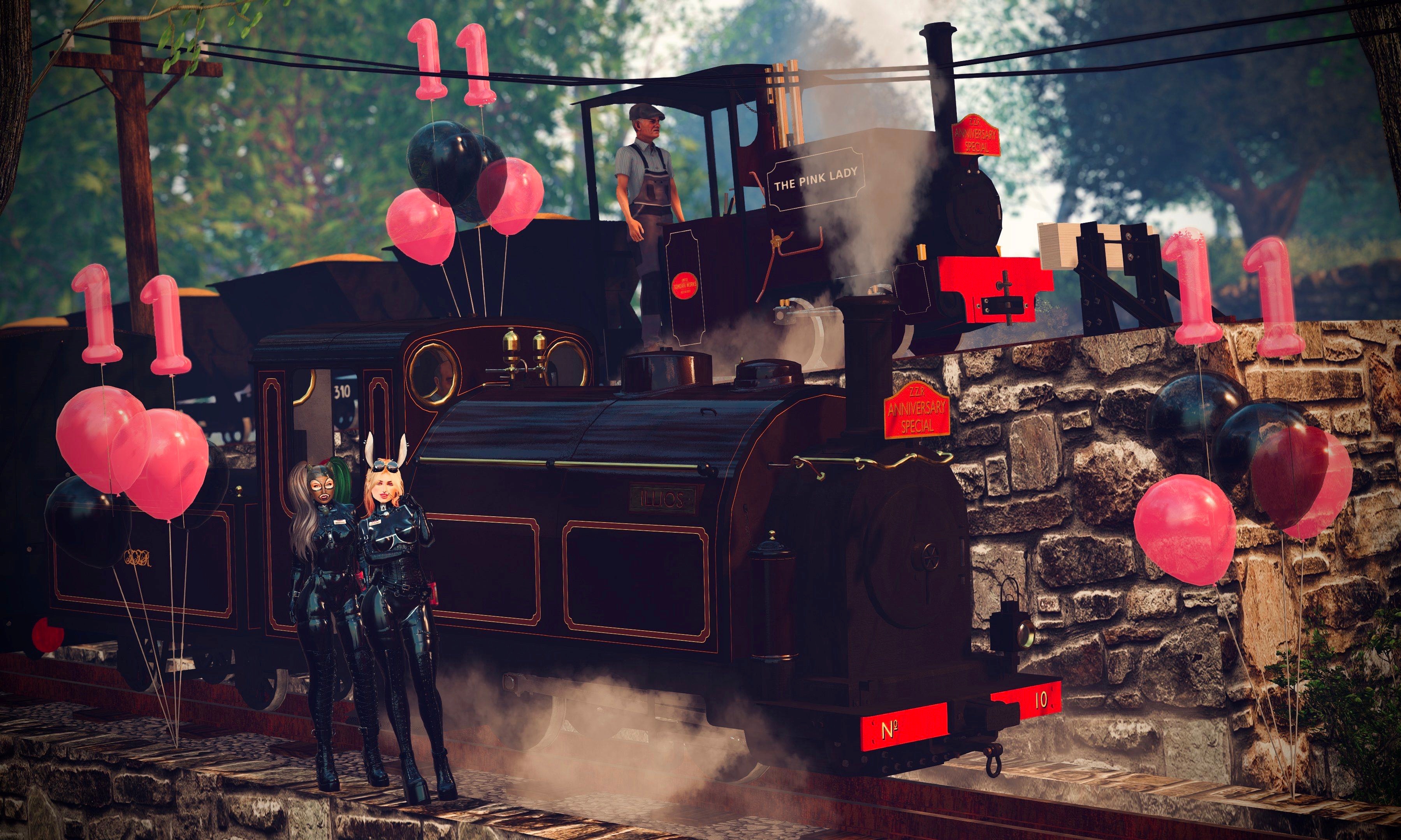 Eesoov Elan and Zen Rabbit standing in front of Zany Zen Railway locomotive Illios, with The Pink Lady on tthe higher siding.