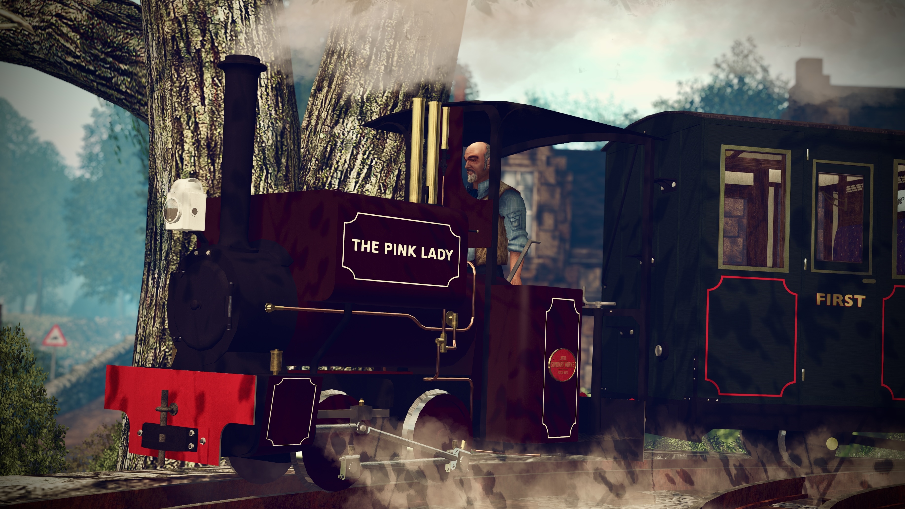 The Zany Zen Railway Locomotive The Pink Lady chuffing around the bend in to Little Coverston station.