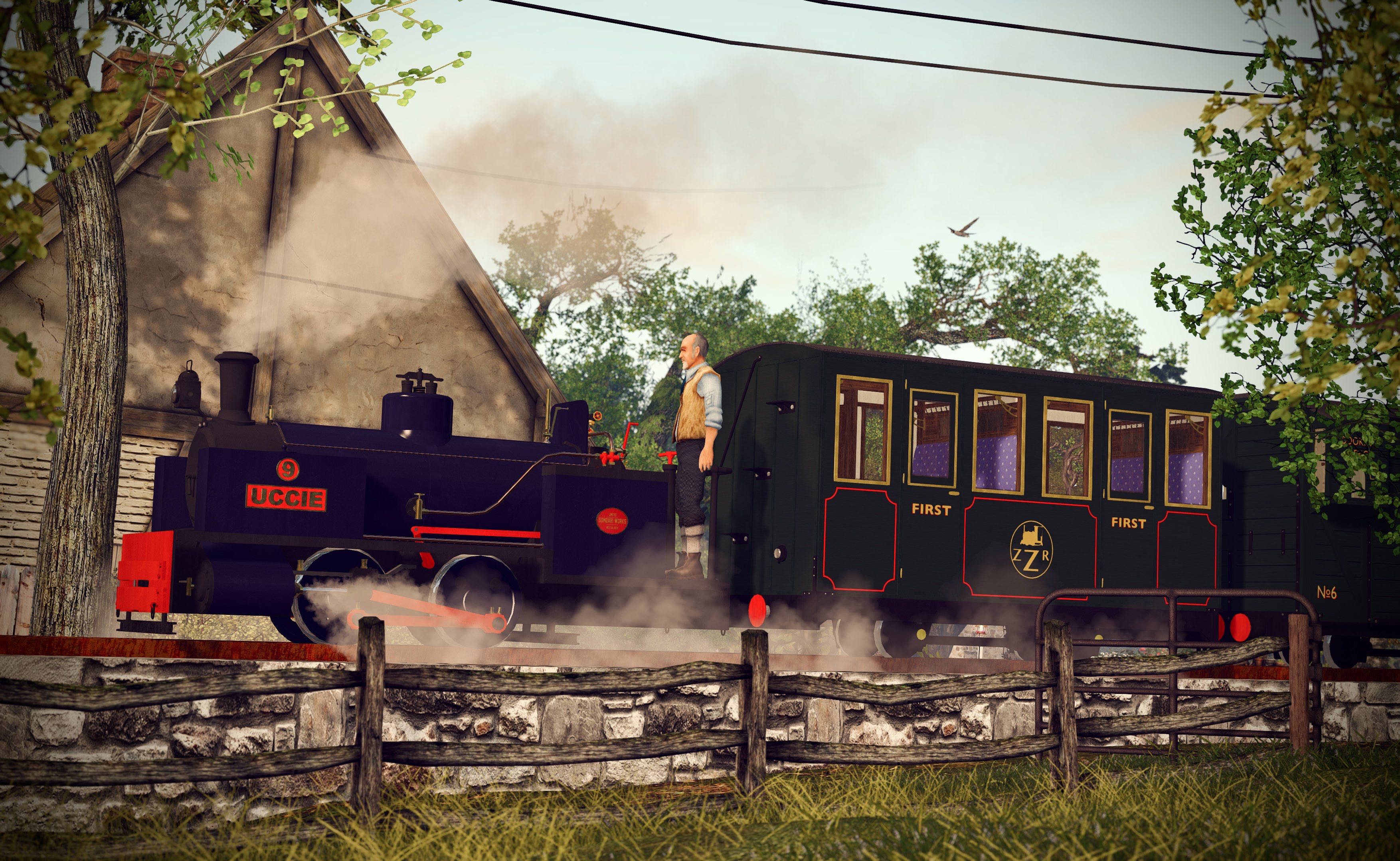 Zany Zen Railway locomotive Uccie chuffing past a apple orchard that resides next to the railway line