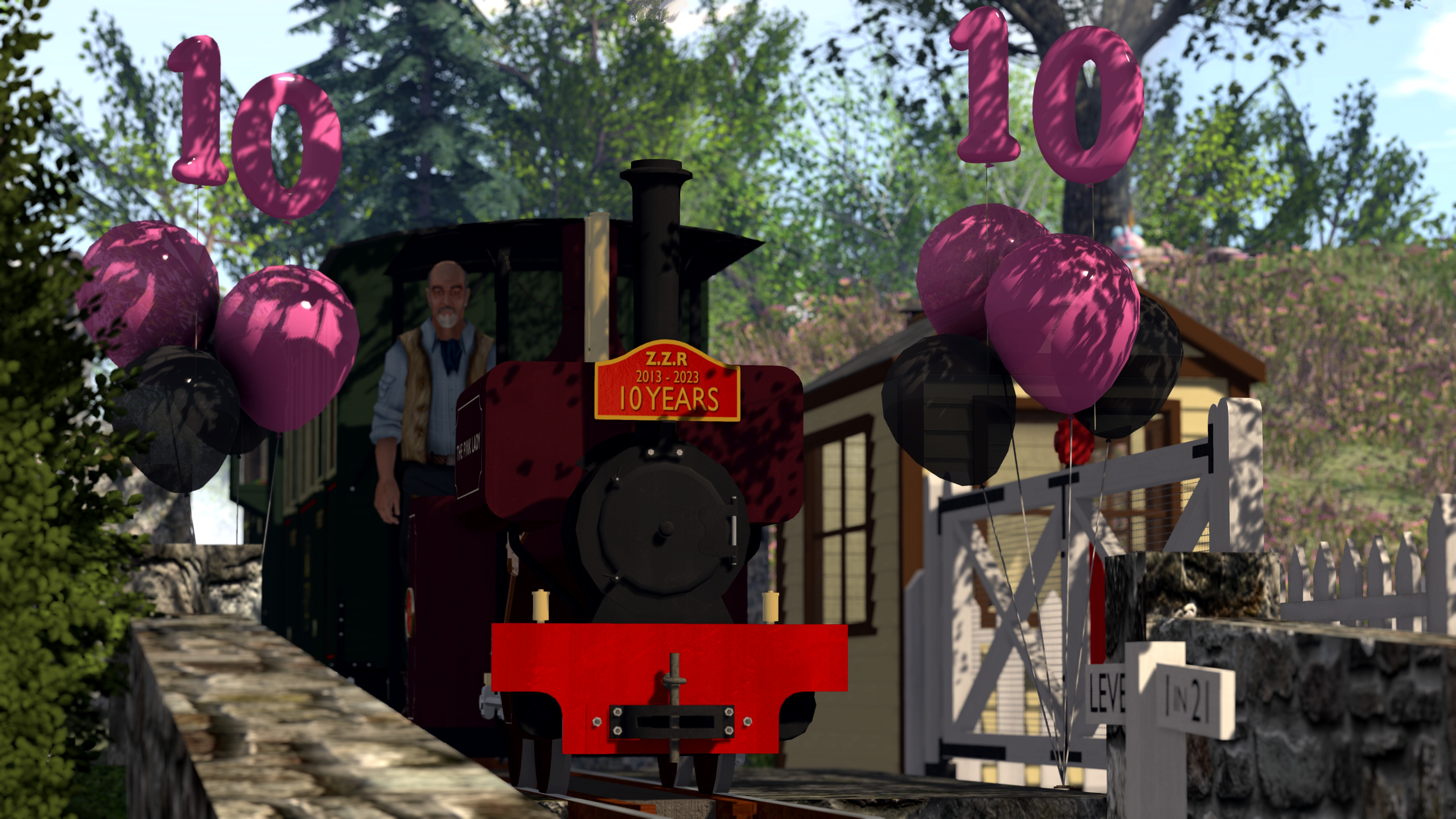 The Zany Zen Railways Pink Lady idling between two bunches of balloons for her 10th birthday